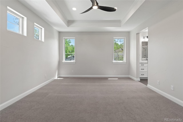1970 S Logan St, Denver, CO 80210 - unfurnished bedroom featuring a raised ceiling, carpet flooring, baseboards, and ensuite bath