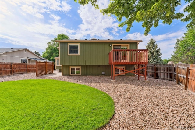 13849 W 66th Dr, Arvada, CO 80004 - back of property with a fenced backyard and a wooden deck