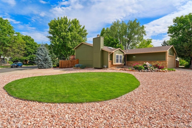 13849 W 66th Dr, Arvada, CO 80004 - view of front facade with a chimney, a garage, and curved driveway