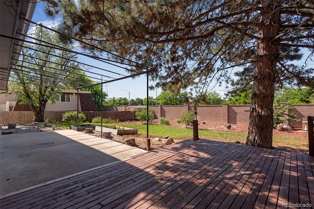 10851 E Iliff Pl, Aurora, CO 80014 - wooden deck featuring a fenced backyard and a patio area