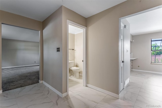 10851 E Iliff Pl, Aurora, CO 80014 - bathroom featuring marble look tile flooring and toilet