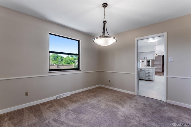 10851 E Iliff Pl, Aurora, CO 80014 - unfurnished room featuring carpet flooring and baseboards