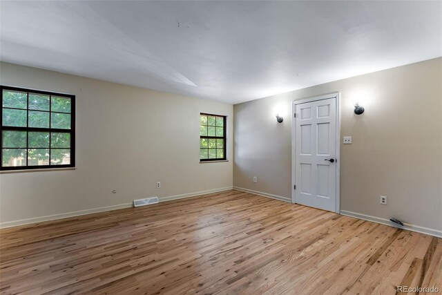 10851 E Iliff Pl, Aurora, CO 80014 - empty room featuring light wood-style flooring and baseboards