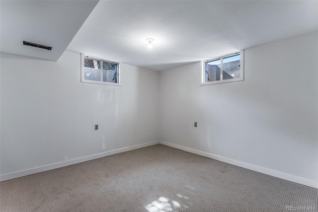 10851 E Iliff Pl, Aurora, CO 80014 - basement with plenty of natural light and carpet flooring