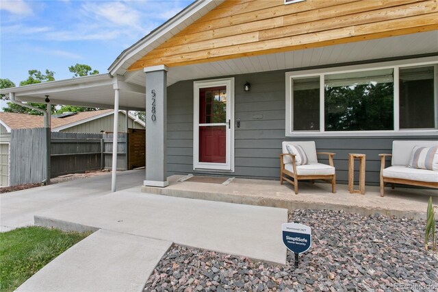5280 S Logan St, Littleton, CO 80121 - view of exterior entry with a porch