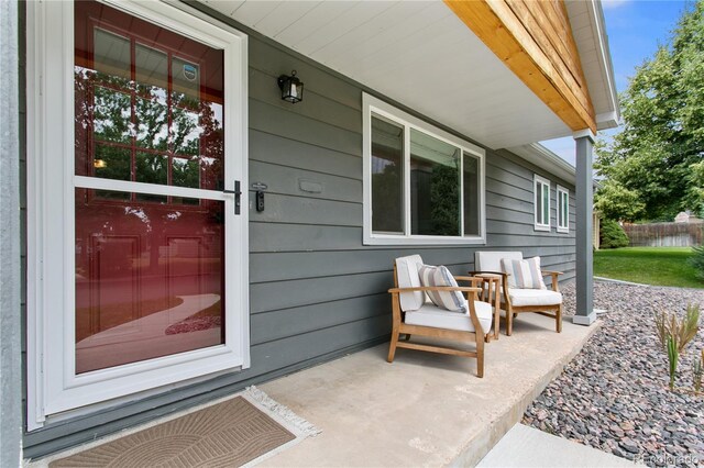 5280 S Logan St, Littleton, CO 80121 - property entrance with a porch