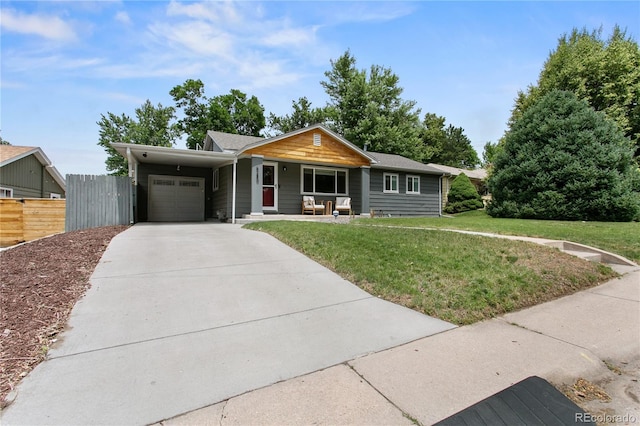 5280 S Logan St, Littleton, CO 80121 - single story home featuring driveway, a porch, and a garage