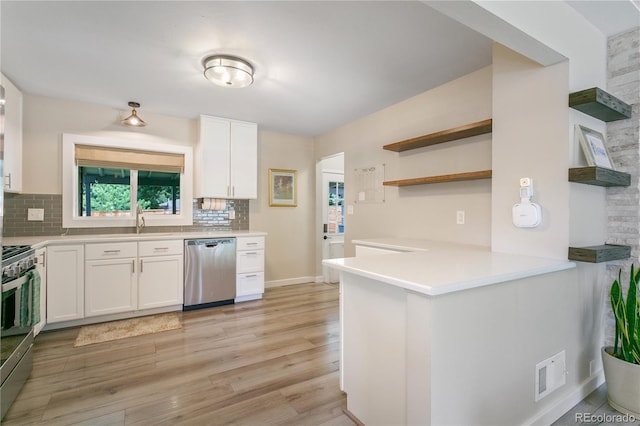 5280 S Logan St, Littleton, CO 80121 - kitchen featuring appliances with stainless steel finishes, open shelves, tasteful backsplash, and white cabinetry