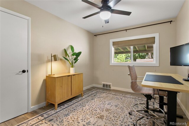 5280 S Logan St, Littleton, CO 80121 - office area with light wood finished floors and a ceiling fan