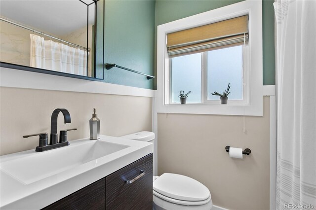 5280 S Logan St, Littleton, CO 80121 - bathroom with vanity and a shower with shower curtain