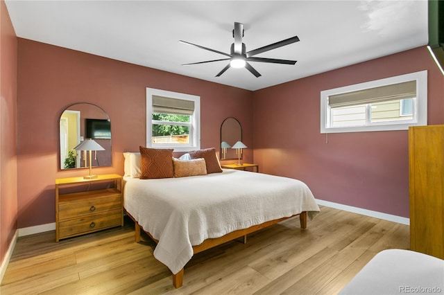 5280 S Logan St, Littleton, CO 80121 - bedroom with light wood-type flooring and ceiling fan