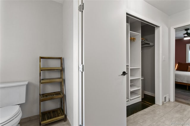 5280 S Logan St, Littleton, CO 80121 - ensuite bathroom featuring toilet and a closet