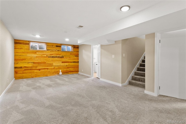 5280 S Logan St, Littleton, CO 80121 - finished below grade area with wood walls, carpet, stairway, and recessed lighting