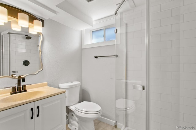 5280 S Logan St, Littleton, CO 80121 - bathroom featuring a stall shower, vanity, and a textured wall