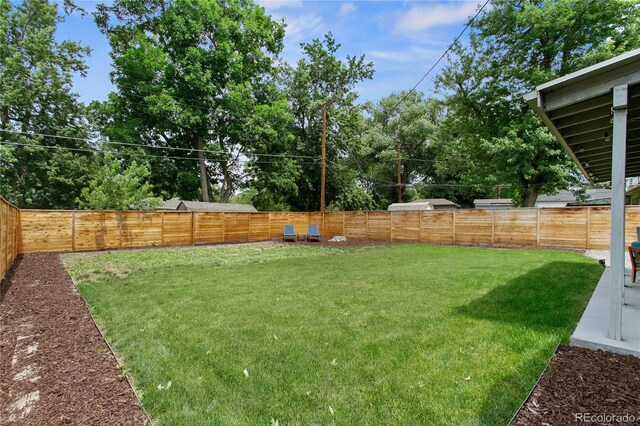 5280 S Logan St, Littleton, CO 80121 - fenced backyard featuring view of scattered trees