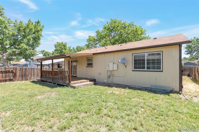 3577 S Ouray Cir, Aurora, CO 80013 - back of house featuring a fenced backyard and a wooden deck