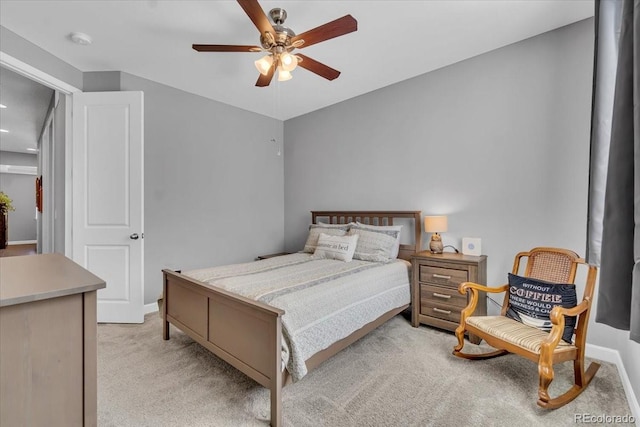 23913 E Swallow Cir, Aurora, CO 80016 - bedroom featuring light colored carpet and a ceiling fan