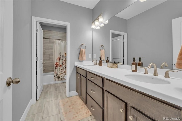 23913 E Swallow Cir, Aurora, CO 80016 - full bath featuring double vanity, shower / bathtub combination with curtain, and tile patterned flooring