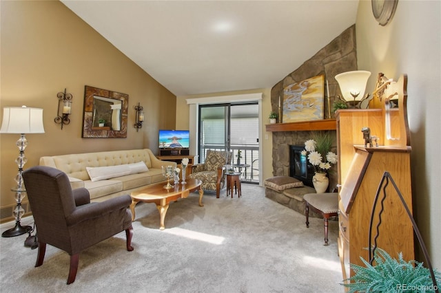 living room featuring carpet floors, vaulted ceiling, and a fireplace