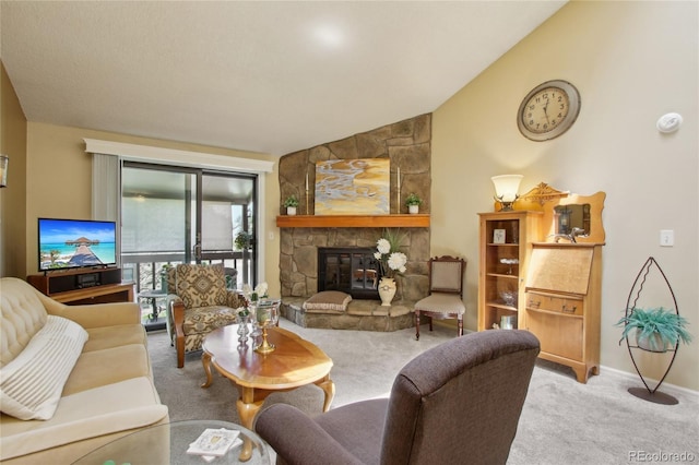 living room with carpet, a fireplace, vaulted ceiling, and baseboards