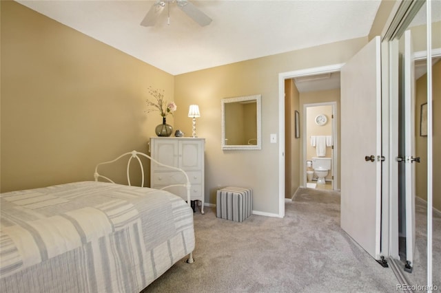 carpeted bedroom featuring radiator heating unit, baseboards, and a ceiling fan