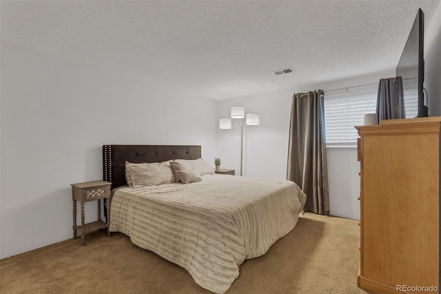 1611 Garfield Ave Unit 2, Louisville, CO 80027 - carpeted bedroom with a textured ceiling