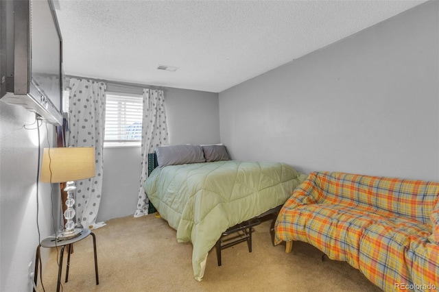 1611 Garfield Ave Unit 2, Louisville, CO 80027 - carpeted bedroom with a textured ceiling