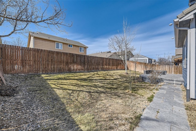 view of yard featuring a fenced backyard