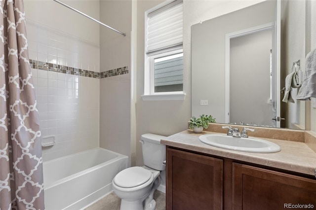 full bathroom featuring shower / bath combo with shower curtain, toilet, tile patterned floors, and vanity