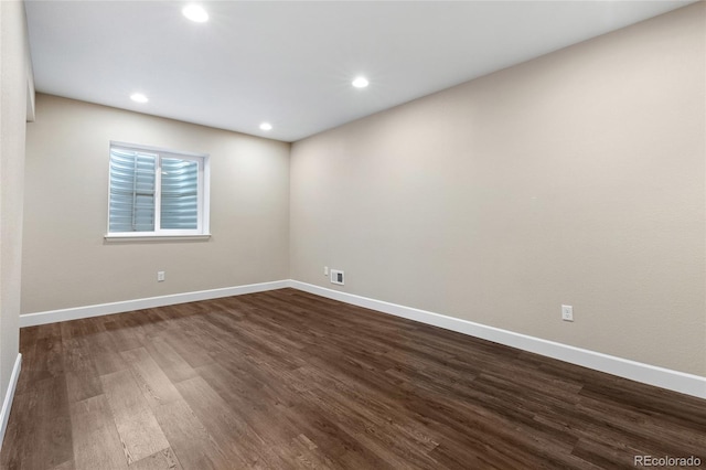 unfurnished room featuring hardwood / wood-style floors