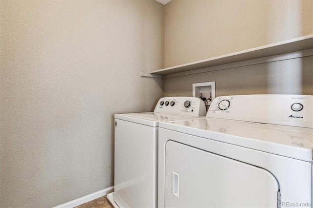 laundry area with independent washer and dryer