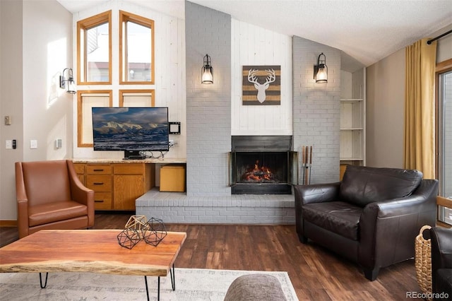 living room featuring a fireplace, dark wood-type flooring, lofted ceiling, and a textured ceiling