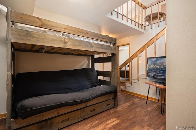 bedroom featuring dark hardwood / wood-style floors