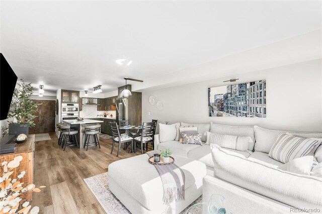 1551 Larimer St Unit 1405, Denver, CO 80202 - living area featuring light wood-style flooring