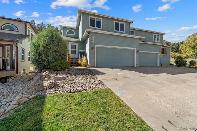 front of property with a garage