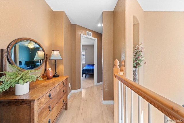 hallway featuring light wood-type flooring