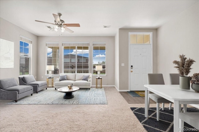16212 E Geddes Ln Unit 11, Aurora, CO 80016 - carpeted living area with a ceiling fan, healthy amount of natural light, and baseboards