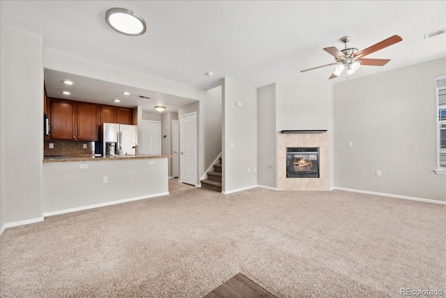 16212 E Geddes Ln Unit 11, Aurora, CO 80016 - unfurnished living room featuring stairway, ceiling fan, baseboards, light colored carpet, and recessed lighting