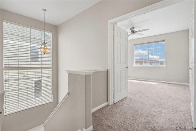 16212 E Geddes Ln Unit 11, Aurora, CO 80016 - corridor with an upstairs landing, baseboards, and carpet flooring