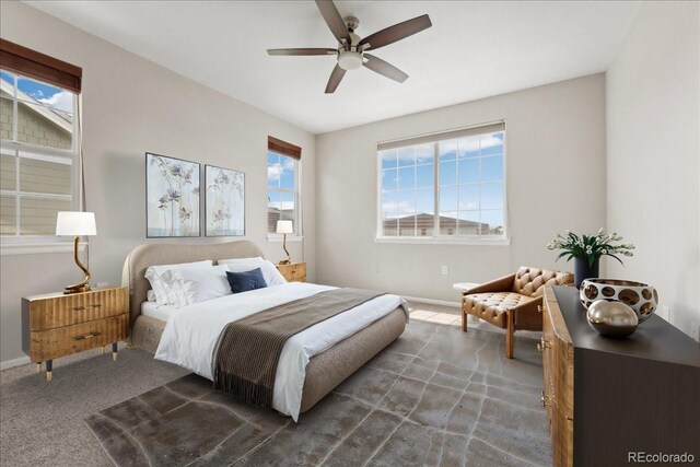 16212 E Geddes Ln Unit 11, Aurora, CO 80016 - carpeted bedroom featuring baseboards and ceiling fan