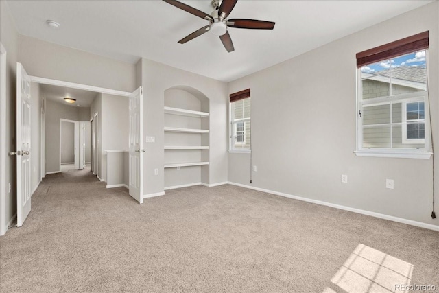 16212 E Geddes Ln Unit 11, Aurora, CO 80016 - carpeted empty room with a ceiling fan, built in shelves, baseboards, and a smoke detector