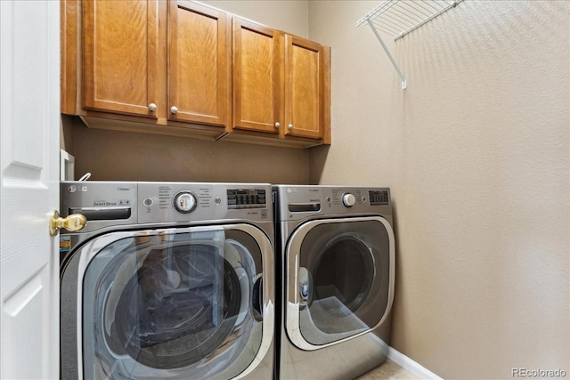 16212 E Geddes Ln Unit 11, Aurora, CO 80016 - clothes washing area featuring cabinet space and washer and dryer