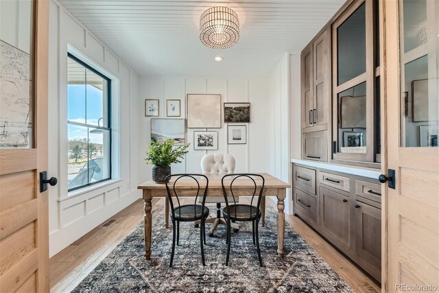 dining room with light hardwood / wood-style floors