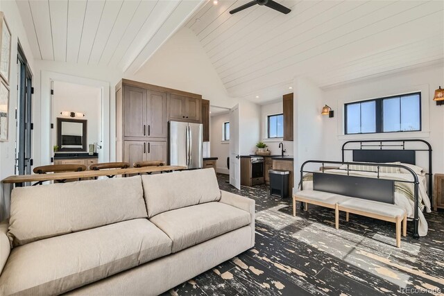 carpeted living room featuring ceiling fan, wooden ceiling, high vaulted ceiling, and sink