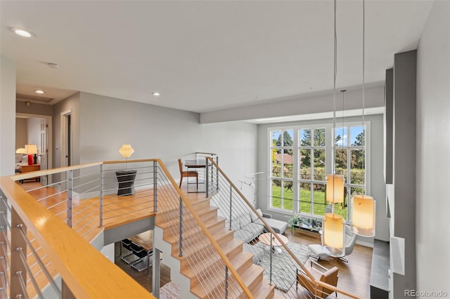10293 E Sheri Ln, Englewood, CO 80111 - stairs featuring wood finished floors and recessed lighting