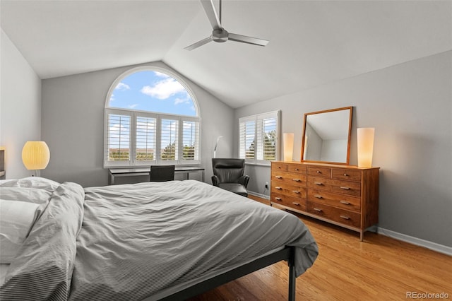 10293 E Sheri Ln, Englewood, CO 80111 - bedroom with lofted ceiling, wood finished floors, and a ceiling fan