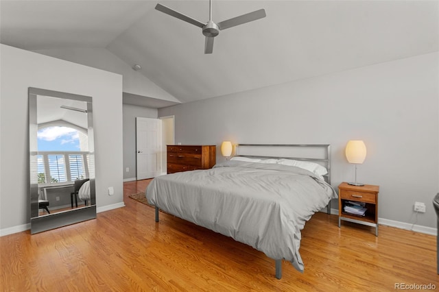 10293 E Sheri Ln, Englewood, CO 80111 - bedroom with vaulted ceiling, light wood-style floors, and a ceiling fan