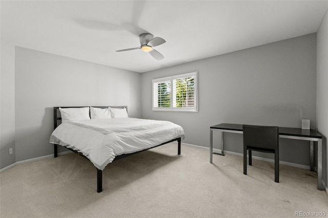 10293 E Sheri Ln, Englewood, CO 80111 - bedroom featuring light carpet and a ceiling fan
