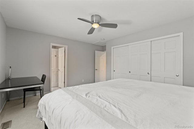 10293 E Sheri Ln, Englewood, CO 80111 - bedroom featuring light carpet, a closet, ceiling fan, and connected bathroom