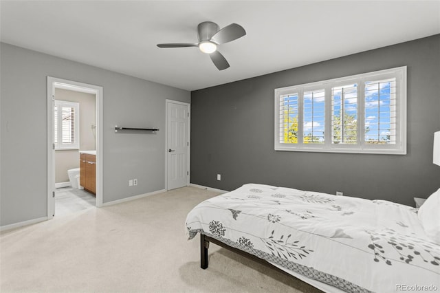 10293 E Sheri Ln, Englewood, CO 80111 - carpeted bedroom featuring a ceiling fan and connected bathroom